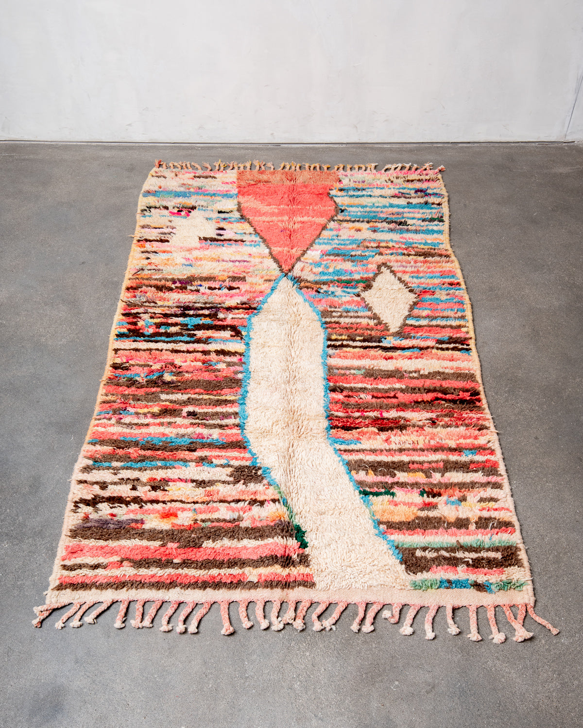 Modern, designer, handcrafted Berber rug from Morocco. Vintage carpet with beautiful colours and patterns and fluffy texture.